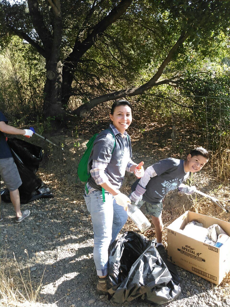 Volunteers cleaning up the creek